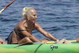 All content cited is derived from their respective sources. Hier Paddelt Donatella Versace 65 Im Bikini Durchs Meer Promiflash De