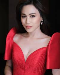 My dear Toni's @celestinegonzaga 2nd look at the Inaugural Address of  President Bong Bong Marcos. She looks stunning in this custom  #MarkBumgarner Filipiniana in red featuring micro pleated bodice ,  cascading drape