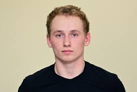 Wrestling: Warriors split pair of conference matches