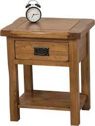 Choose an extra small oak side table to fit in perfectly next to a sofa, with just the right amount of room for a table lamp or even a cosy candle. Cotswold Oak Lamp Table Modern Furniture Direct