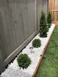 White Stone Garden With Little Giant Globe Cedars And Emerald Cedars White Stone Garden With Little Gi White Pebble Garden Pebble Garden White Stone Garden