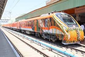 An image of a subway train in India, it's orange