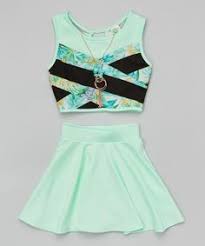 A white table lamp is placed on top of the drawers. 27 Best Crop Tops For Kids Ideas Crop Tops For Kids Cute Outfits Crop Top Outfits