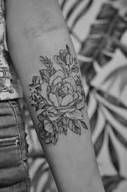 Black and white flowers tattoo. Grayscale Photo Of Floral Arm Tattoo Photo Free Skin Image On Unsplash