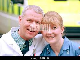 Casualty veteran actress cathy shipton, who plays nurse lisa duffin, known  as 'duffy', is welcomed back to the hit bbc series after a long absence, by  fellow veteran derek thompson (plays charlie fairhead), at a photocall in  bristol today (mon). hi-res stock ...