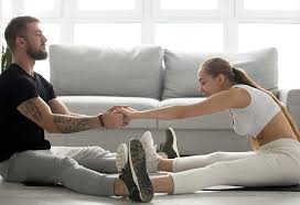 Practicing these five couple's yoga poses can strengthen your body and mind. Couple Yoga Benefits Poses To Try With Your Partner