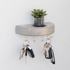 With our 15 diy key holder ideas, you can spruce up the decor of your entrance bringing it to your decor and embellishing level. 35 Unique Wall Key Holders For Your Home S Entryway Key Holder Diy Wall Key Holder Apartment Decorating For Couples