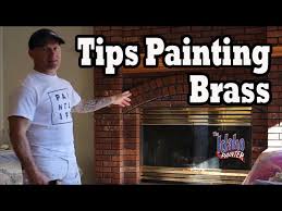 I knew with a little spray paint, we could update those suckers in no time!! Brass Painting Hacks Instructions Painting A Brass Fireplace Black Youtube