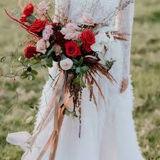 Cheap wedding bouquet for bridal bridesmaids, turquoise and ivory bouquet of artificial roses flowers. 11 Of The Prettiest Wrapped Wedding Bouquets