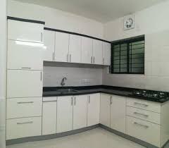 Authentic panels allow the refrigerator and cook top controls to blend in. Acrylic Kitchens Acrylic L Shape Modular Kitchen Manufacturer From Mumbai