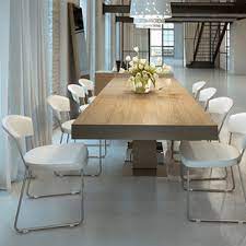 The simple, robust design is crafted from solid oak and reinforced at the base with stretchers. Extendable Dining Table Houzz