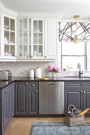 Glass Front Upper Cabinets And Gray Lower Cabinets With Marble Chevron Tiles Contemporary Ki Kitchen Cabinets Makeover Kitchen Remodel Kitchen Inspirations