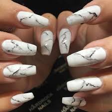 White Marbled Coffin Nails This White Marbled Look On The Coffin Nails Looks Equally Stylish And Eye Ca Marble Acrylic Nails Nail Designs Acrylic Nail Designs Marble nail art has become very popular.