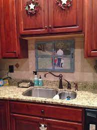 Most kitchen sinks i see are under the window, so open space above the sink. Living A Mommy Life Townhouse Conundrum Kitchen Sink Decor Kitchen Sink Remodel Sink Decor