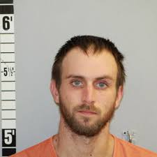 Helena man arrested, charged with with burglarizing storage sheds