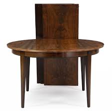 Rosewood dining room table and chair sets boast a classically traditional style and come in a range of designs to suit every dining room design and each personal taste. Buch Erik A Rosewood Dining Room Consisting Of A Circular Extension Table With Three Extra Leaves And Four Chairs Mutualart