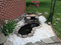 Small Fish Pond With Pebbles And Stones And Waterfall Garden Pond Design Small Backyard Ponds Ponds For Small Gardens