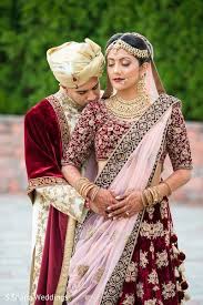 Indian Groom Hugging Indian Bride On Their Wedding Ceremony Outfits By Hennabypallavi Karishmamua Karishma Makeup Artist Indian Bride Indian Groom Bride
