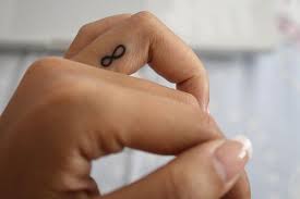 The symbol resembles a geometric figure called a lemniscate. Pin By Jennifer Peyton Copeland On Wedding Ideas Infinity Finger Tattoos Finger Tattoos Infinity Tattoos