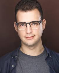 Tyler Mell (He/him/his)! Tyler is an actor and singer, a graduate of Boston  Conservatory at Berklee, and is currently living in New York! Tyler worked  as a Super at the Met in