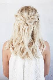 Do not secure with an elastic to avoid melting after iron use. Picture Of A Twist Half Up Braid With Wavy Hair Down Is Easy To Make And Will Take A Couple Of Minutes
