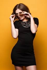 Shoes worn with the little black dress should be of very good to excellent quality because they are a feature piece and people's eyes will be drawn to them. Free Photo Portrait Of Beautiful Smiling Brunette Woman Model In Black Dress With Evening Makeup And And Red Lips Isolated On Gray