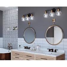 We are going to investigate a portion of the vanity sets that are being offered by home depot. Progress Lighting Hansford Collection 3 Light Antique Bronze Clear Glass Coastal Bath Vanity Light P300051 020 The Home Depot