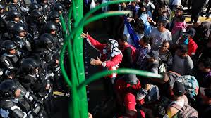 See the article in its original context from. A Surge Of Migrants Rushes A Mexican Border Crossing The New York Times