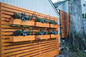 They have a very messy back yard & i would like to block the view of their yard, but i do not want to plant bushes or hedges i want a quick fix without costing a fortune. How To Hide An Ugly Chain Link Fence At Charlotte S House