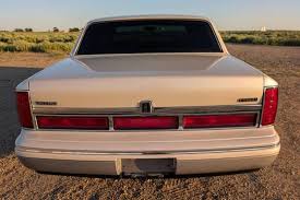 Image result for Ivory 1995 Town Car