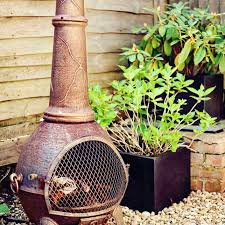 Fire pit chimney, when it's attached to the stone or concrete fire pit reminds an outdoor fireplace, which looks much more interesting and adds completely different character to the patio or backyard. What Is A Chiminea