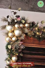 How To Make A Christmas Doorway Garland With Ornaments Christmas Doorway Decorations Christmas Wreaths Grinch Christmas Decorations