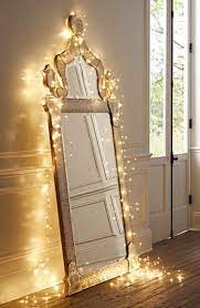 Adding battery powered lights to mason jars makes for a pretty centerpiece. 17 Diy Ways To Use Fairy Lights In Your Decor