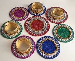 Tealight Holder Diya And Coasters You May Buy The Golden Tealight Holders Seperately In Variations Or Keep T Diwali Diya Decoration Diwali Craft Diy Candles