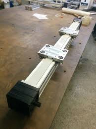 Triger Kayis Tahrikli Lineer Modul Tm90x90 Lineer Modul 8m 50 Triger Kayis 16 Lik Induksiyonlu Kromlu Mil Rv202 Makarali Rulman Lineertronik Lineer Modul