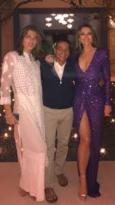 Damian, 17, whose dad is millionaire. Liz Hurley Dazzles In Plunging Dress As She Rings In New Year With Son Damian Who Looks Even More Like Her
