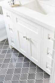 Several space saving devices were used in this small bathroom. White Small Bathroom Floor Tile Ideas Trendecors