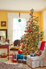 Christmas wreath above fireplace decorated with christmas balls and stockings. 24 Christmas Tree Ideas Best Holiday Decorations For The Tree