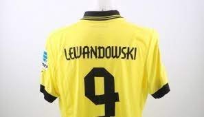 Puma cat logo embroidered over the right chest and both sleeves. Lewandowski B Dortmund Match Worn Shirt Bundes Liga 12 13 Charitystars