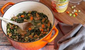 Add sausage, potatoes, kale, and mushrooms to the stockpot. Spicy Sausage And Kale Soup