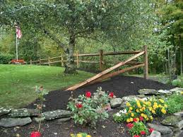 Gallery featuring images of 28 split rail fence ideas for residential homes, a selection of beautiful, rustic fences that don't cost a fortune. Split Rail Fence Rustic Landscaping Driveway Entrance Landscaping Fence Landscaping