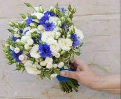 White and cornflower blue bridesmaid bouquets. Petite Wedding Bouquet White Lisianthus White Roses White Matricaria Blue Cornflower Cornflower Wedding Cornflower Wedding Bouquet Wedding Bouquets