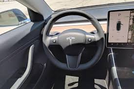 There are no physical controls, which can make sifting through the touch screen's menus risky while driving. 2020 Tesla Model 3 Review Trims Specs Price New Interior Features Exterior Design And Specifications Carbuzz