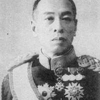 Col. Tadisha Tanida briefs Lt. Gen. Junji Suzuki, front