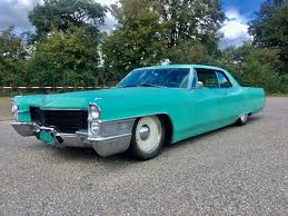 Image result for Alpine Turquoise 1965 Cadillac