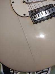 Big paint crack repair | Fender Stratocaster Guitar Forum