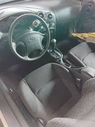 Image result for Lithium Yellow 2001 Tiburon