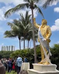 A massive 22 foot gold statue of President Trump just got unveiled at Trump National Doral Miami and social media is completely losing it. The giant gold figure shows President Trump raising his fist ...