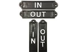 Office door signs and door name plates take many forms and help visitors see that they've arrived at the right place. In Out Door Signs