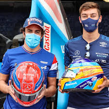 This 1:2 scale helmet has been personally signed by esteban ocon. Alonso And Russell Exchange Helmets After Tough Monaco Gp For Spaniard